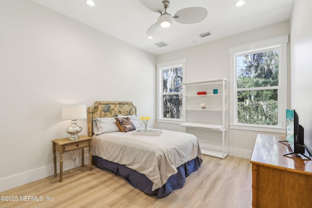 bedroom featuring ceiling fan and light wood-type flooring