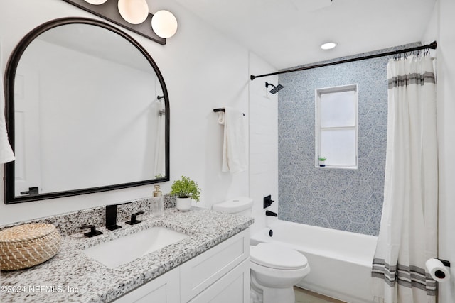 full bathroom with vanity, toilet, and shower / bathtub combination with curtain