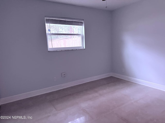 spare room featuring ceiling fan