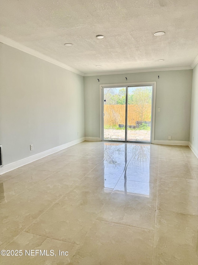 11050 Oak Ridge Dr N, Jacksonville, FL 32225 - spare room featuring crown molding, baseboards, and a textured ceiling