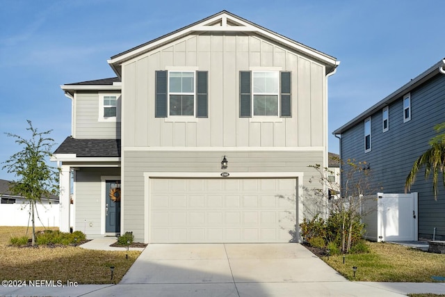 front of property with a garage