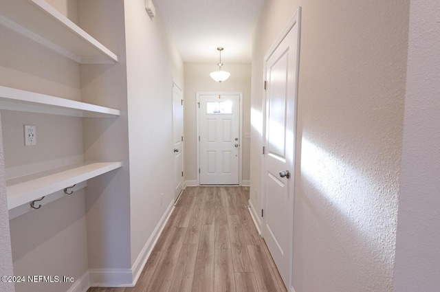 doorway featuring light hardwood / wood-style floors