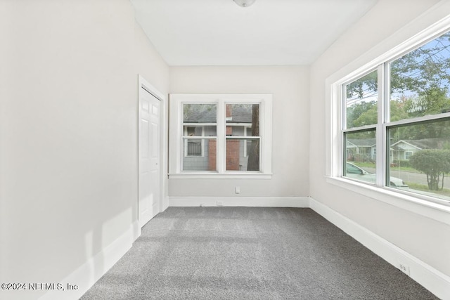 empty room featuring carpet floors