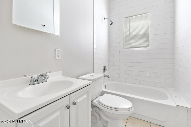 full bathroom with toilet, vanity, tiled shower / bath combo, and tile patterned flooring