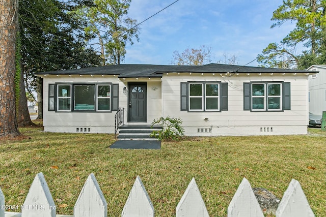 view of front of house with a front yard