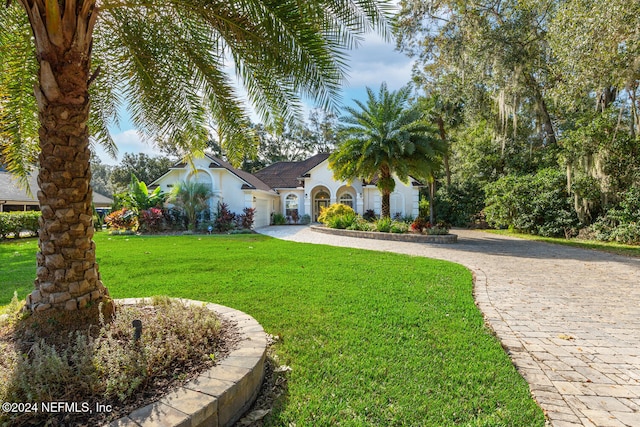 view of front of home with a front yard