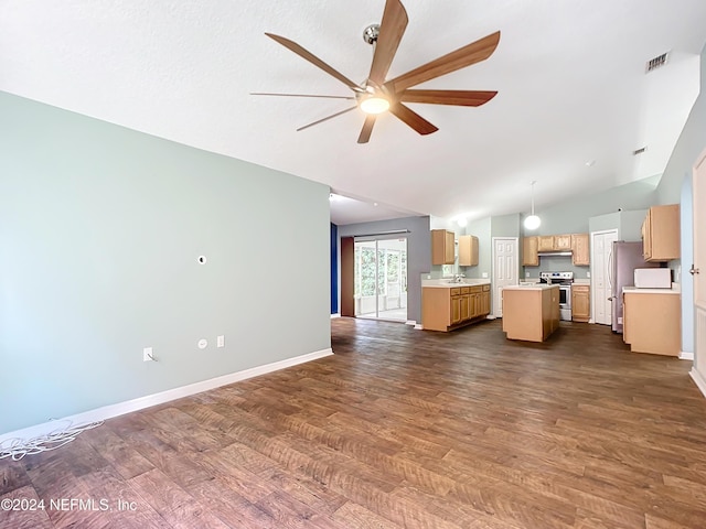 unfurnished living room with ceiling fan, lofted ceiling, and dark wood-type flooring