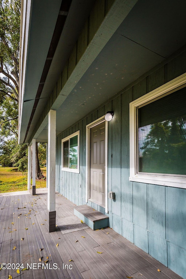 wooden terrace with covered porch