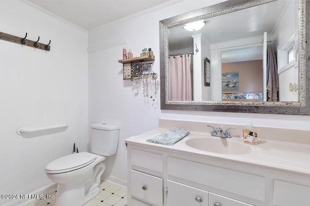 bathroom with tile patterned flooring, toilet, vanity, and ornamental molding