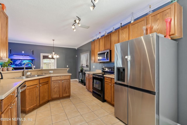 kitchen with sink, hanging light fixtures, an inviting chandelier, appliances with stainless steel finishes, and ornamental molding