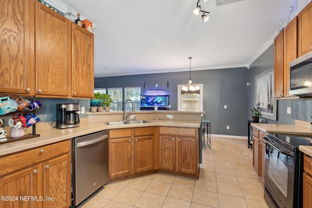 kitchen with sink, stainless steel appliances, a notable chandelier, crown molding, and light tile patterned floors