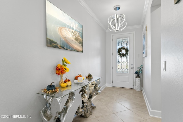 foyer entrance featuring light tile patterned floors, an inviting chandelier, and crown molding