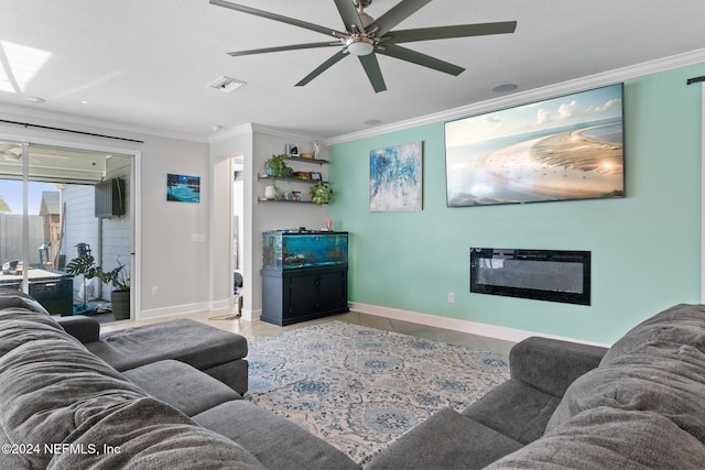 tiled living room featuring ceiling fan and crown molding