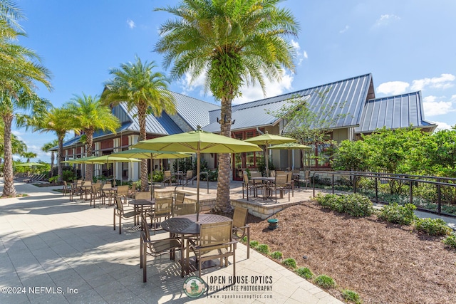 view of property's community with a patio area