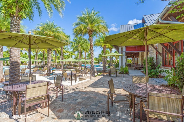 view of patio featuring a pool