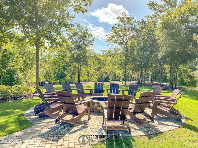 view of patio featuring a fire pit