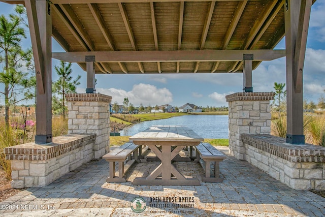 view of patio featuring a water view