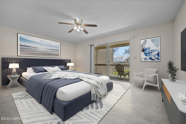 bedroom featuring access to outside, ceiling fan, carpet flooring, and a textured ceiling