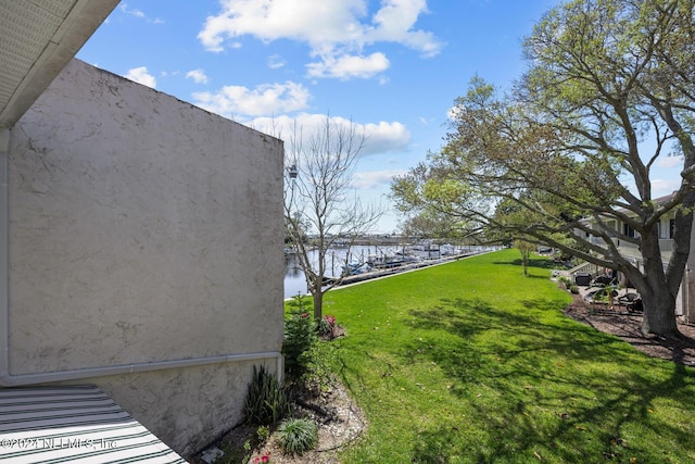 view of yard featuring a water view