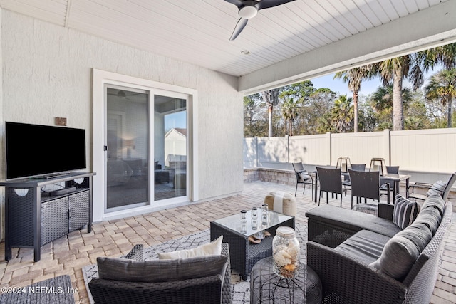 view of patio / terrace with ceiling fan and an outdoor hangout area