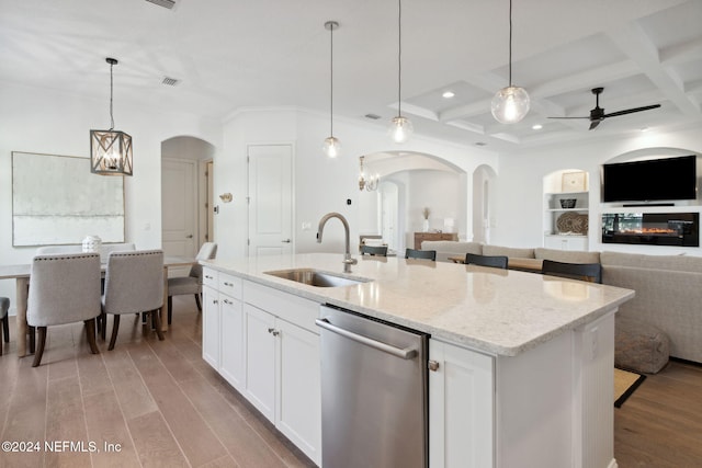 kitchen featuring dishwasher, sink, coffered ceiling, light hardwood / wood-style flooring, and white cabinets