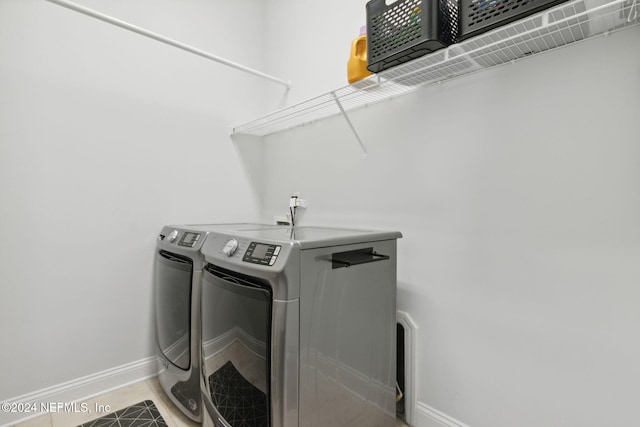 laundry room featuring independent washer and dryer