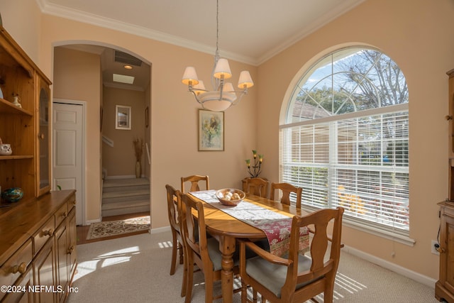 dining area with light colored carpet, plenty of natural light, and ornamental molding