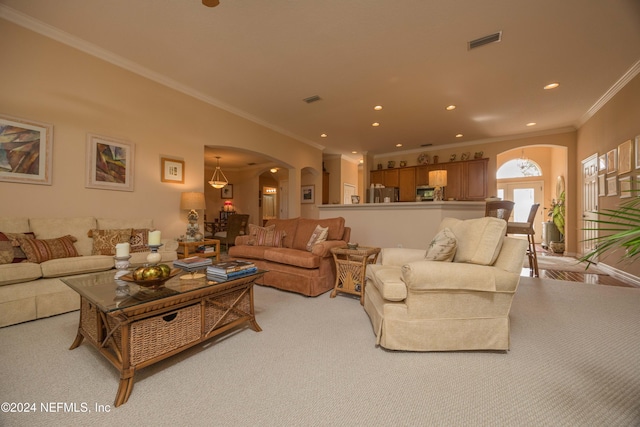 carpeted living room with crown molding