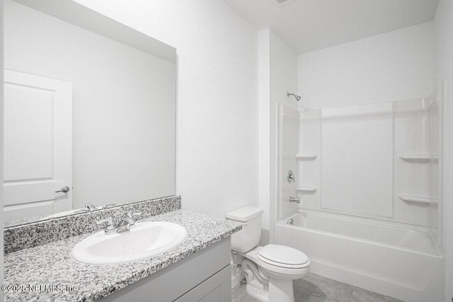 full bathroom featuring shower / tub combination, vanity, toilet, and tile patterned flooring