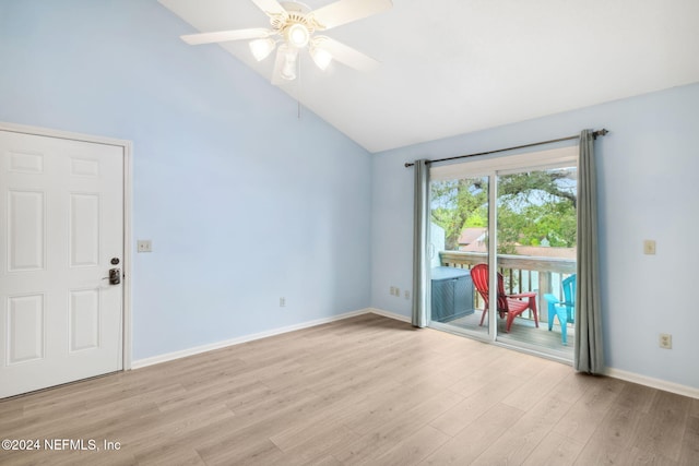 unfurnished room with ceiling fan, light hardwood / wood-style flooring, and high vaulted ceiling