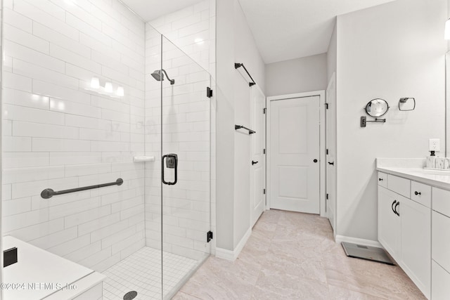 bathroom with vanity and walk in shower