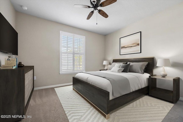 bedroom with light colored carpet and ceiling fan