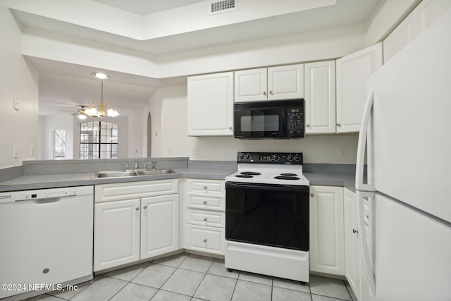 kitchen featuring white cabinetry, sink, white appliances, light tile patterned floors, and ceiling fan with notable chandelier