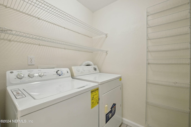 laundry area featuring washing machine and dryer