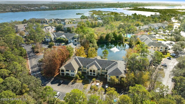 bird's eye view with a water view