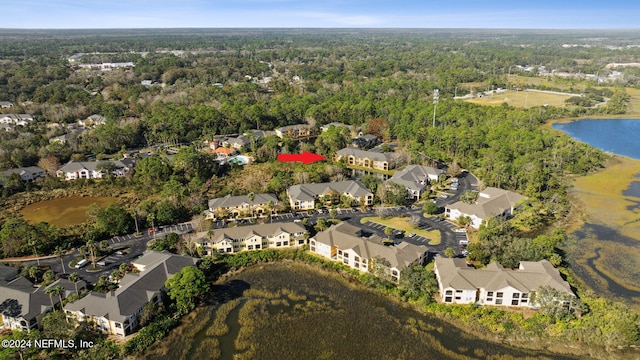 bird's eye view with a water view