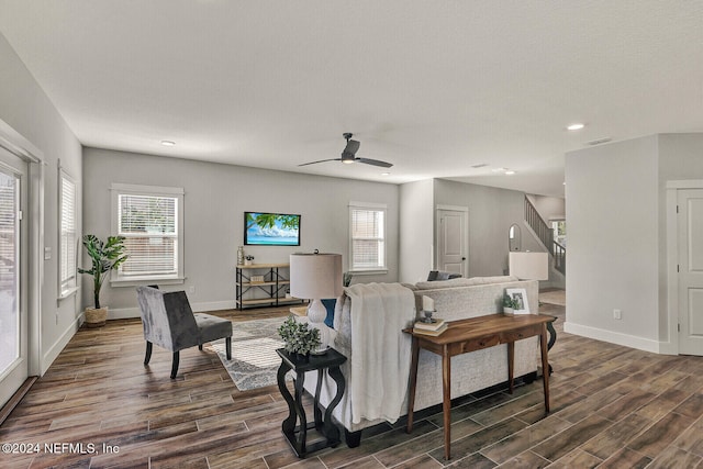 living room featuring ceiling fan