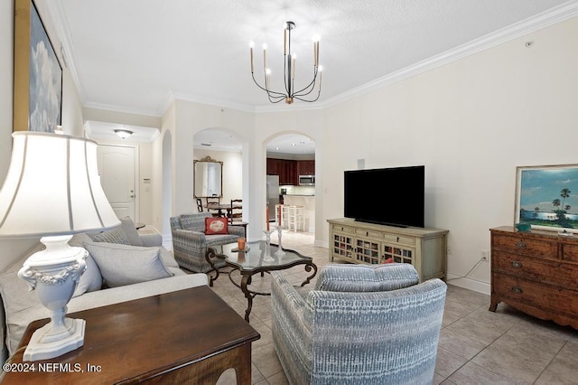 tiled living room featuring crown molding and an inviting chandelier