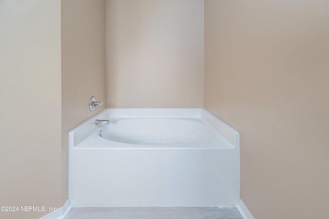 bathroom featuring a bathing tub