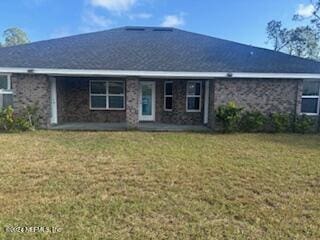 view of front of house featuring a front yard