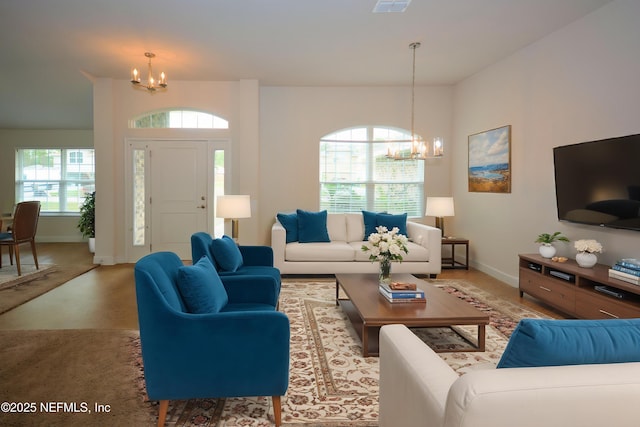 6 Sederholm Path, Palm Coast, FL 32164 - living area featuring an inviting chandelier, visible vents, and baseboards