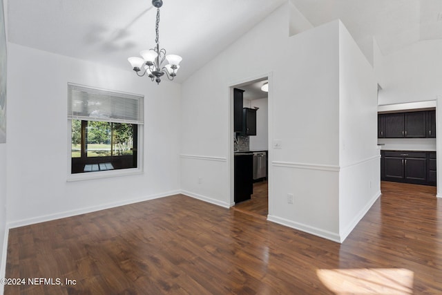 unfurnished room with dark hardwood / wood-style flooring, high vaulted ceiling, and a notable chandelier