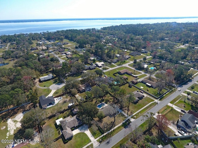 birds eye view of property featuring a water view and a residential view