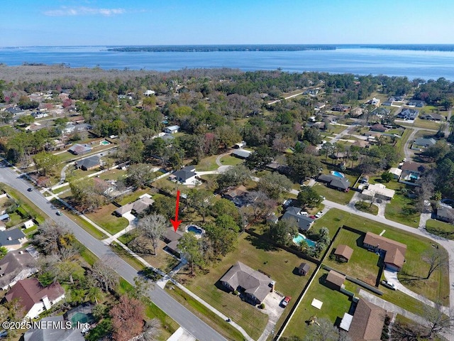 aerial view with a water view and a residential view