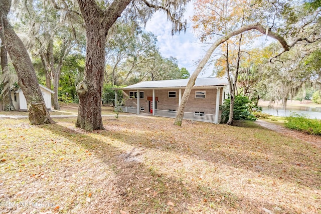 view of front of home with a front yard