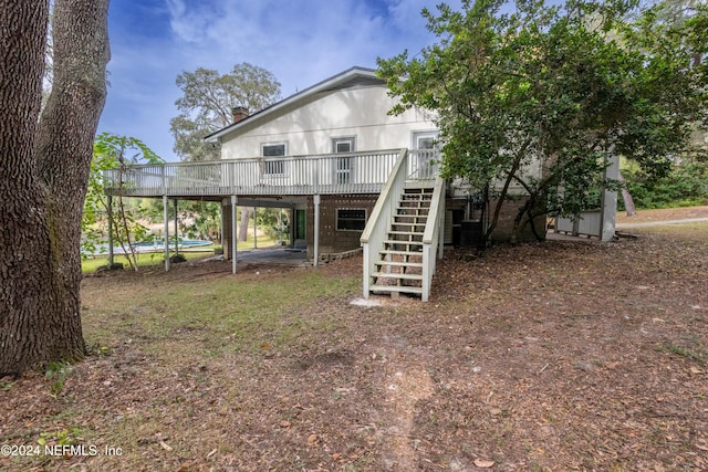 view of yard with a wooden deck