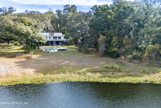 drone / aerial view with a water view