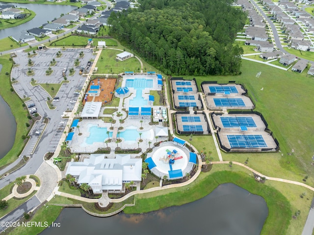 bird's eye view with a water view