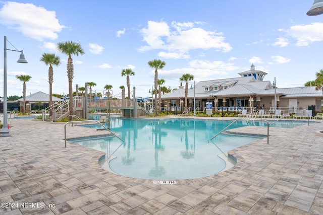 view of pool featuring a patio