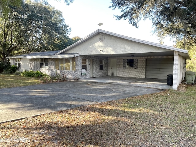 view of front of house with a carport